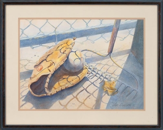 A still life of a baseball glove and ball resting on a chain-link fence.