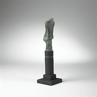 A bronze sculpture of a distorted human figure mounted on a dark pedestal.