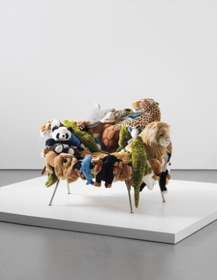 chair made out of stuffed animals