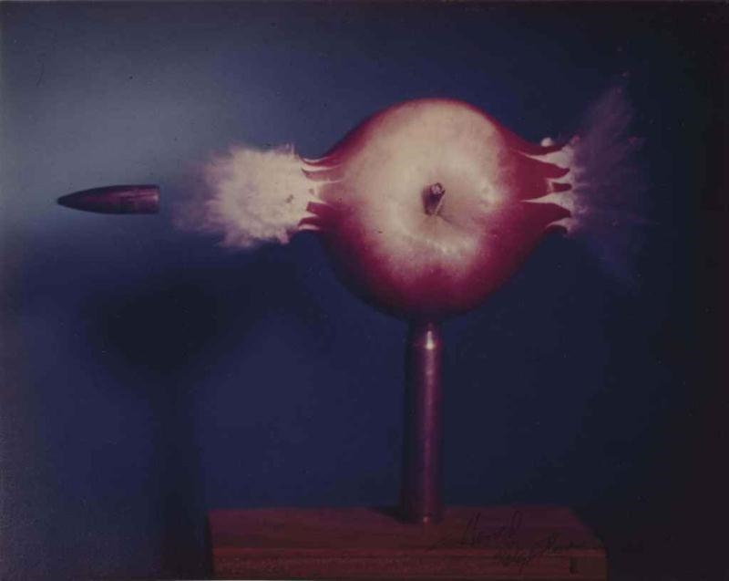Bullet piercing an apple by Harold Eugene Edgerton, 1964