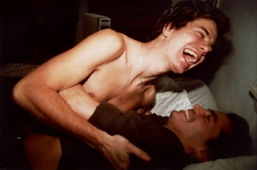 Matt and Lewis on the Bed, Cambridge by Nan Goldin, 1988