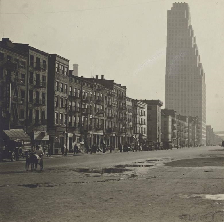 NEW YORK (VIEW NORTH EAST ON SOUTH STREET, 120 WALL STREET BUILDING ON RIGHT) by Berenice Abbott, Circa 1929