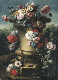 Narcissi, tulips, chrysanthemums, roses and other flowers in a stone urn with hollyhocks, a wooded landscape beyond - Gasparo Lopez