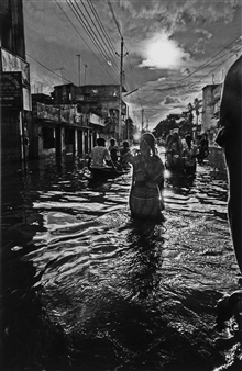Woman Wading in Flood Water - Shahidul Alam