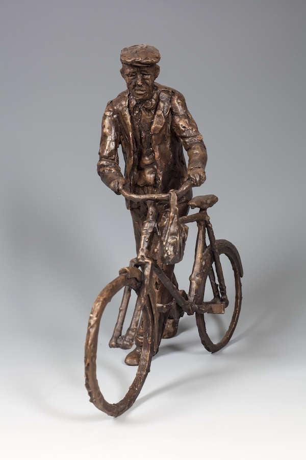 Artwork by Mark Rode, Man Pushing a Bicycle, Made of Bronze