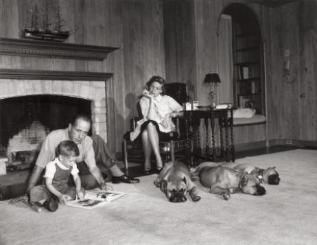 Bogart Bacall and Stephen in their Living Room by Sid Avery, 1952