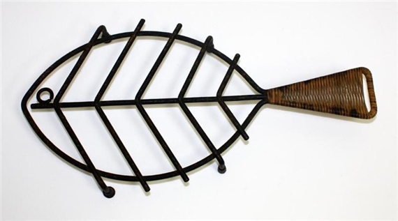 Trivet stand of fish form