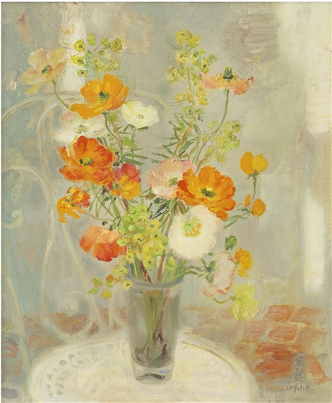 A VASE OF FLOWERS ON A CHAIR