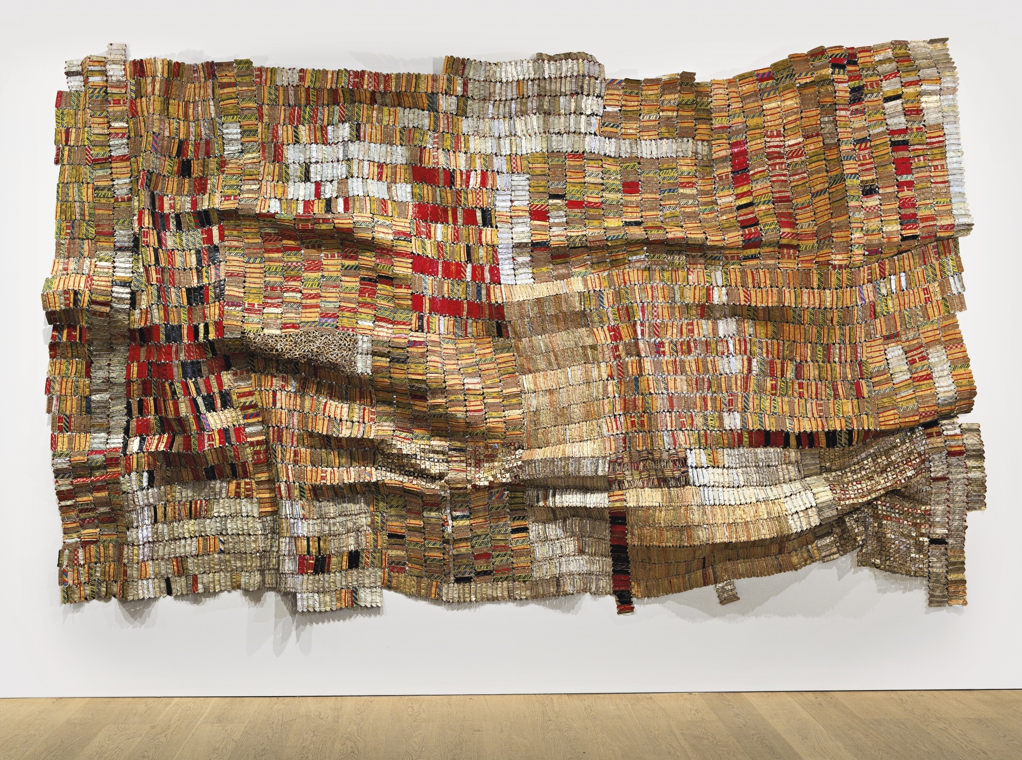 Artwork by El Anatsui, MAN'S CLOTH II, Made of aluminum bottle caps