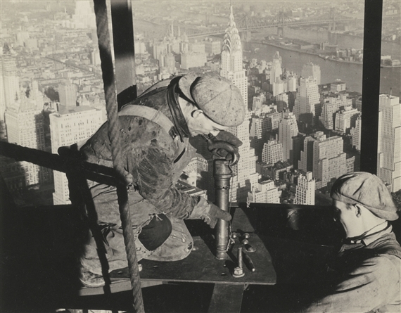 RIVETING AT THE TOP OF MOORING-MAST ON EMPIRE STATE BUILDING by Lewis Hine, circa 1930