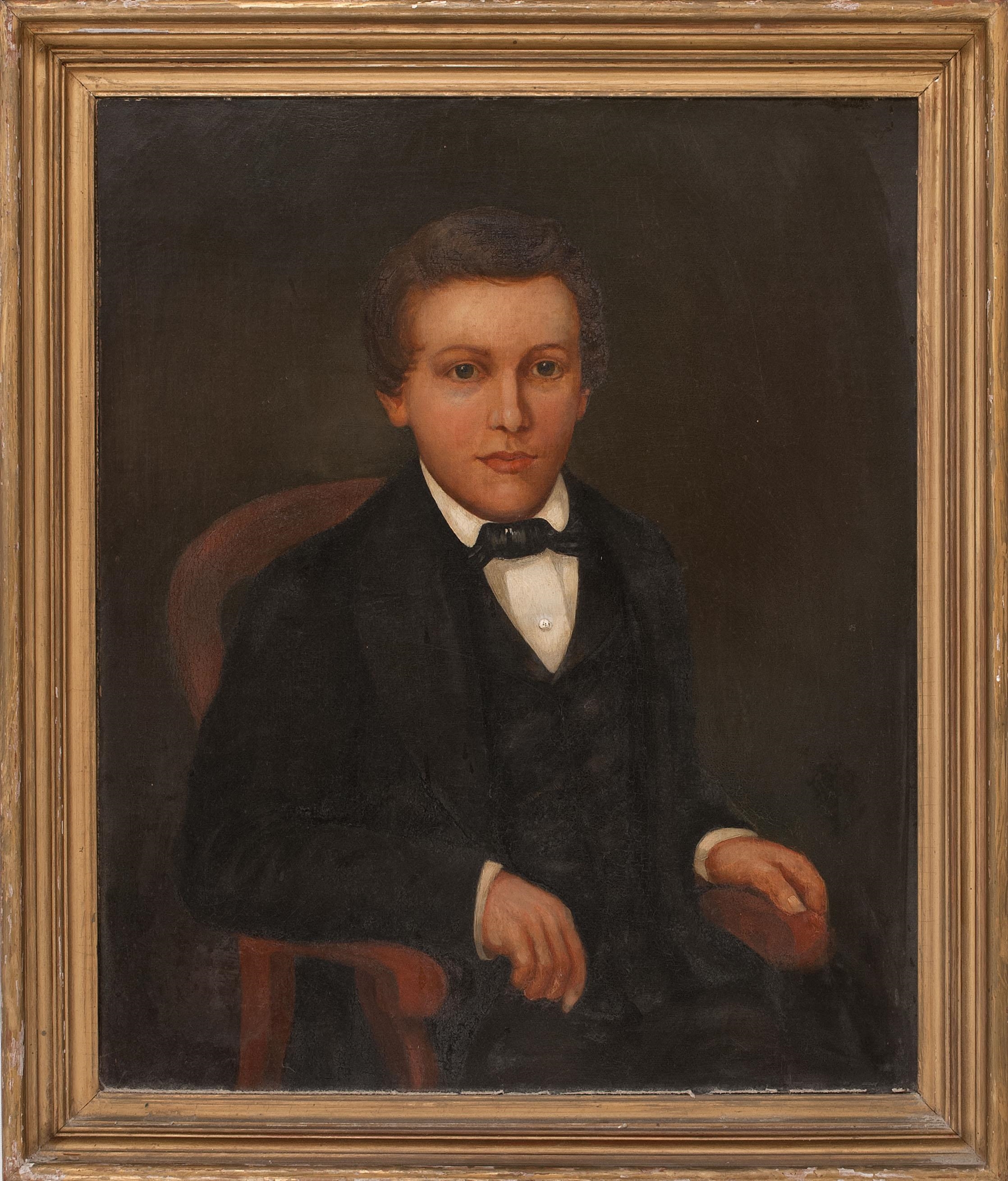 American School, 19th Century | Portrait of a young man seated in a red ...