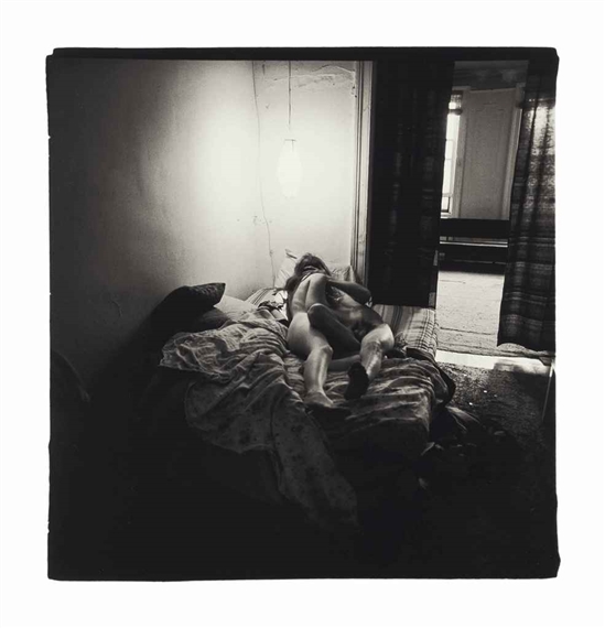 Couple under a paper lantern, N.Y.C. by Diane Arbus, 1966