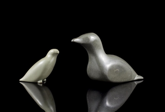 Bird together with a carving of a loon - Annie Ippak