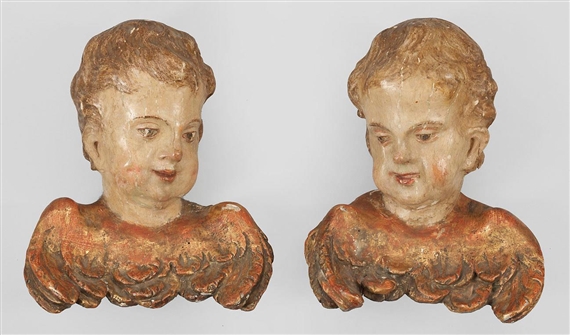 Pair of winged putto heads as counterparts