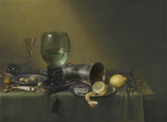 A STILL LIFE OF A ROEMER, AN OVERTURNED ROEMER, A FAÇON-DE-VENISE WINEGLASS, A SILVER BEAKER AND A SILVER AND PEWTER PLATE, WITH A SHEATHED KNIFE, LEMONS, OLIVES, HAZELNUTS, WALNUTS AND A PAPER TWIST OF TOBACCO, ALL ON A TABLE PARTLY DRAPED WITH A GREEN CLOTH - Willem Claesz. Heda