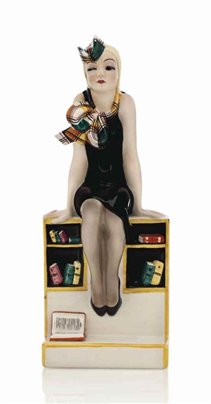 A 'ME NE INFISCHIO - LA STUDENTESSA' FIGURE by Elena König Scavini, 1936