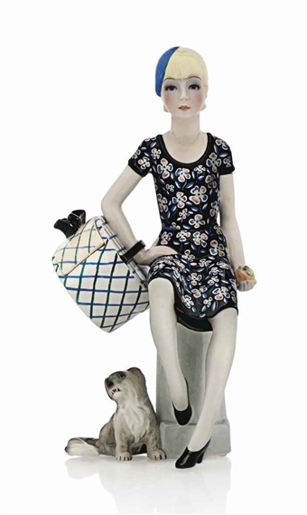 A 'LA MODISTA- IL CAPPELLINO' FIGURE by Elena König Scavini, circa 1933