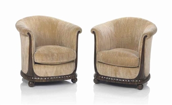 A PAIR OF ARMCHAIRS - Jules Leleu