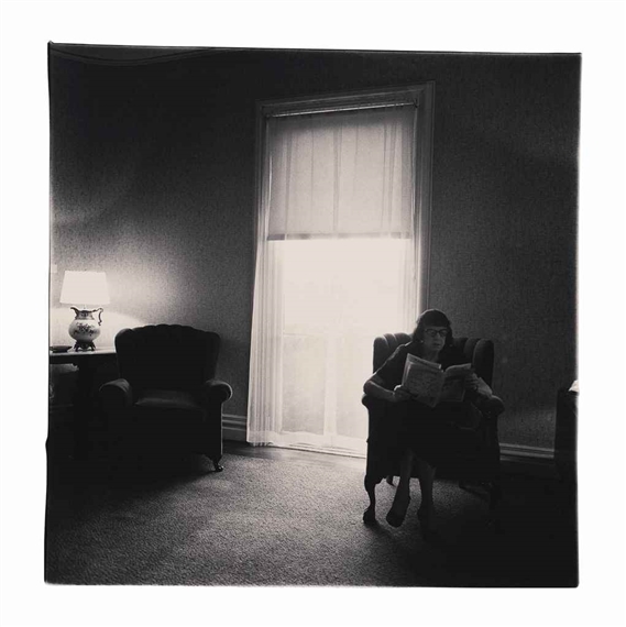 Lady in a rooming house parlor, Albion, NY. by Diane Arbus, 1963