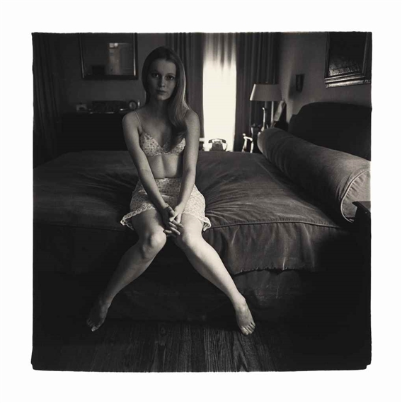 Mia Villiers-Farrow on a bed by Diane Arbus, 1964