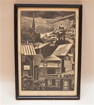 A black-and-white woodcut print of a dense village scene with rooftops, church spires, and a stormy sky.
