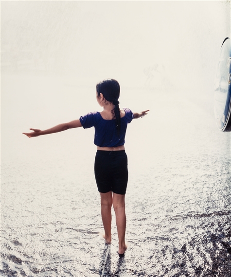 Girl in Spray from Open Pump, Chicago by Paul D'Amato, 1993