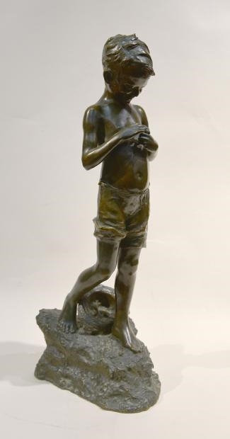Jeune garçon tenant un poisson by Giovanni De Martino