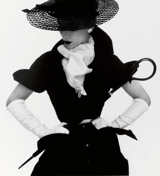 Woman with Umbrella (Lisa Fonssagrives-Penn), New York by Irving Penn, 1950/1984.