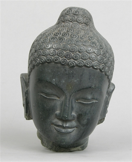 Indian School, 17th Century | Carved Head of Buddha | MutualArt