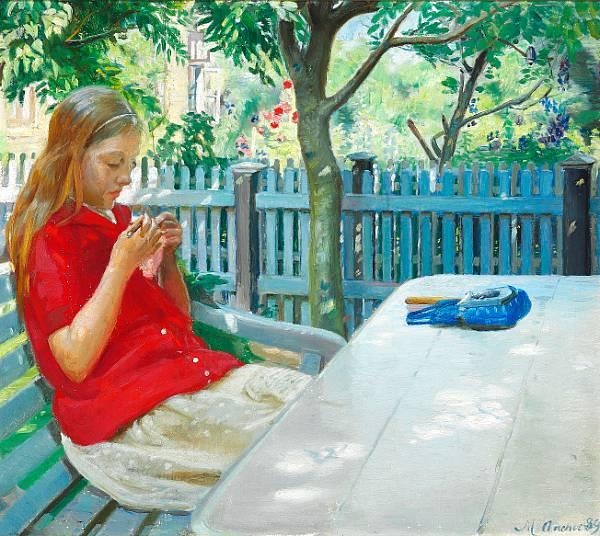 A little girl in red blouse crocheting in the garden