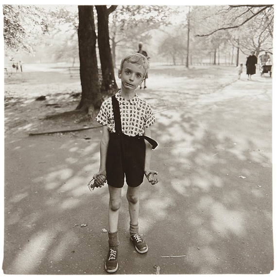 Child with a toy hand grenade in Central Park, N.Y.C.