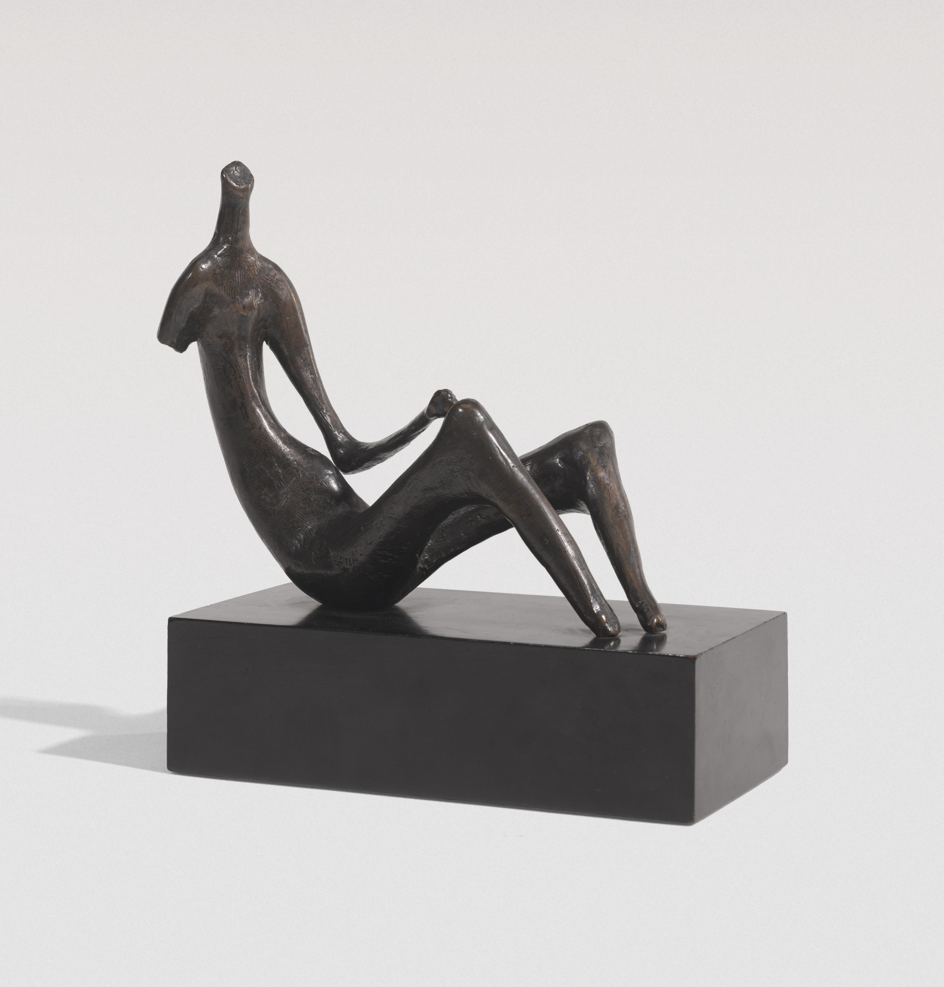 SEATED WOMAN: ONE ARM