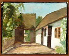 White farm house and a gateway