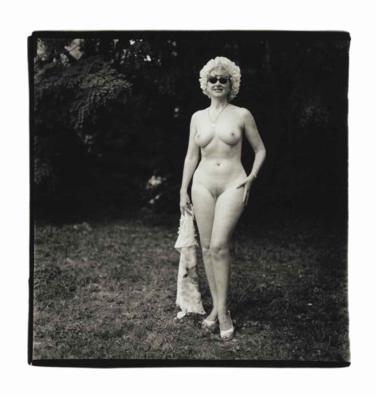 Nudist lady with swan sunglasses, Pa.