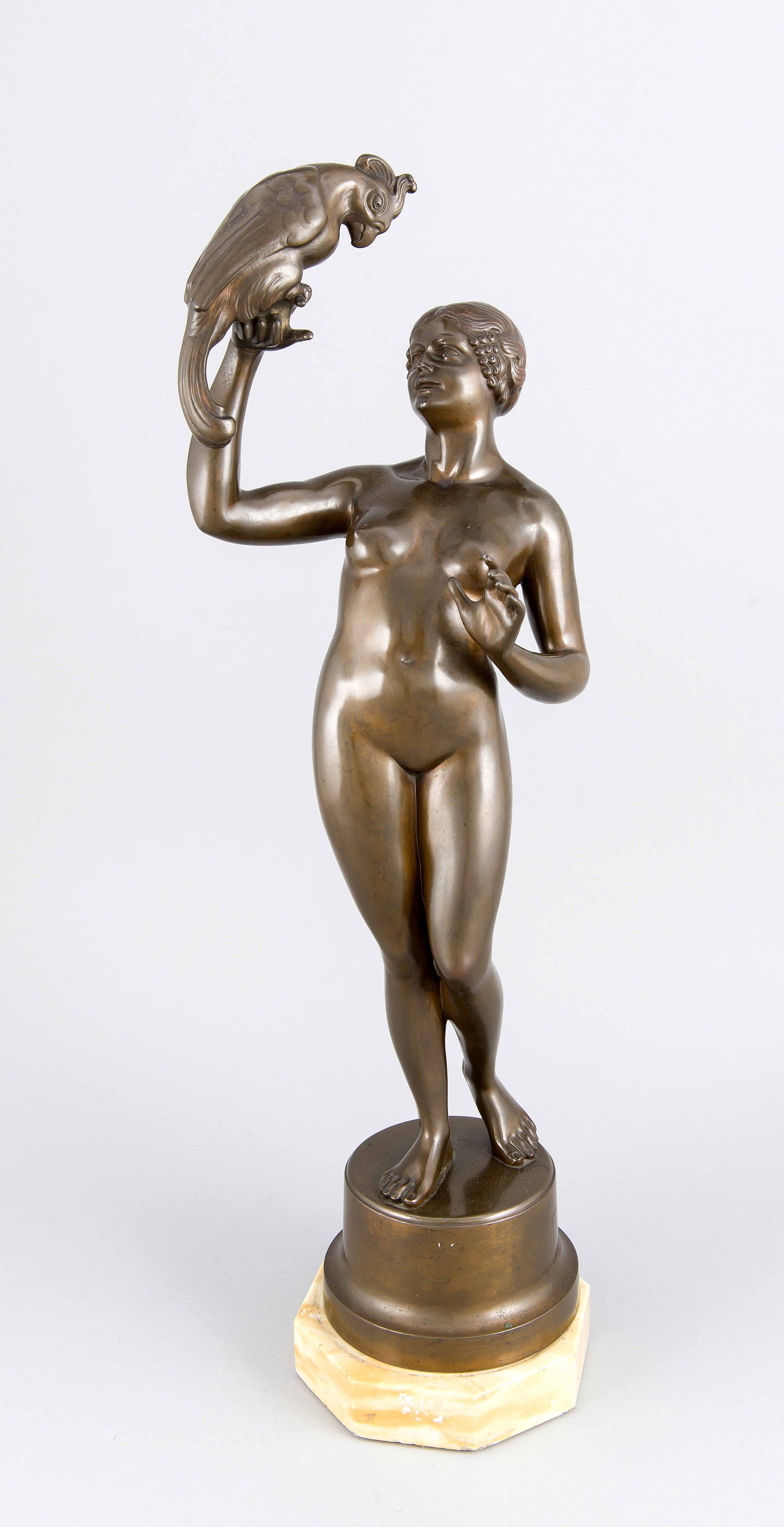 Artwork by Monogrammist E.U.J. , Frauenakt mit Papagei, Made of patinated bronze