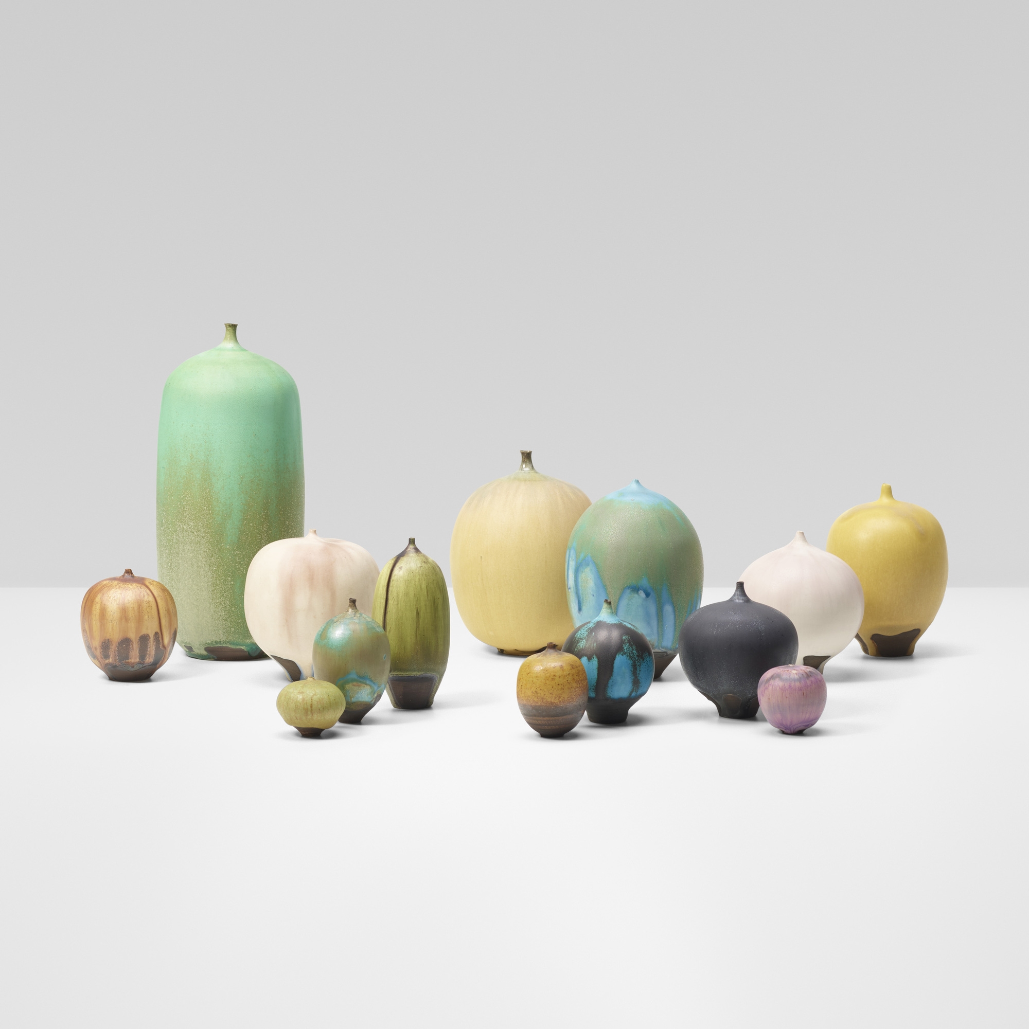 Artwork by Rose Cabat, Erni Cabat, collection of fourteen Feelies, Made of glazed stoneware