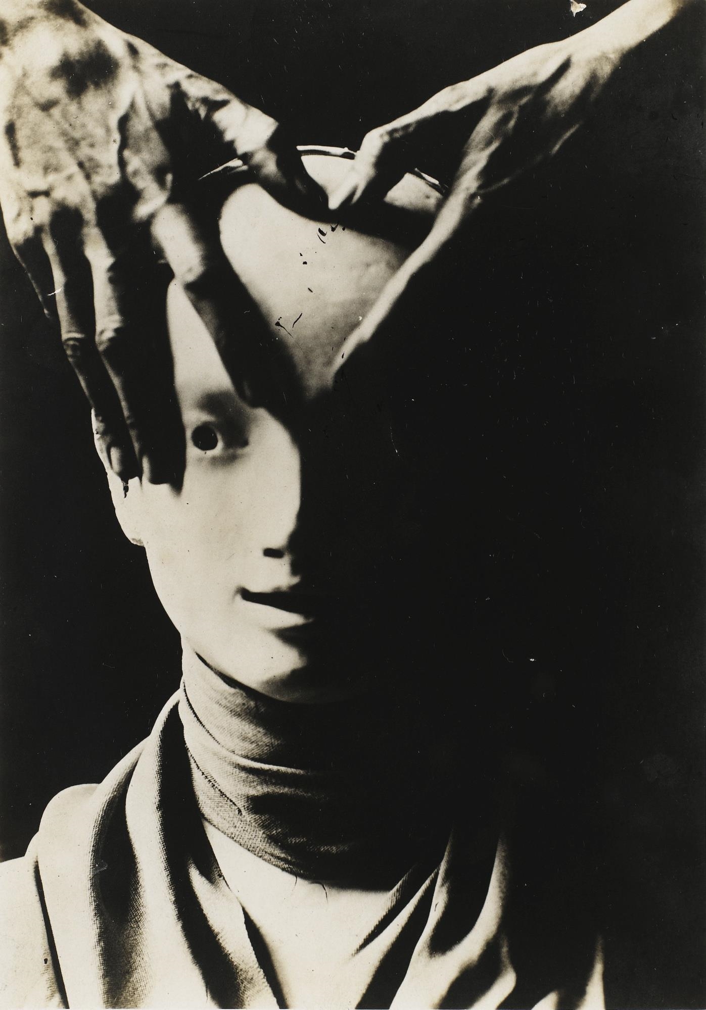 Artwork by Berenice Abbott, COCTEAU’S HANDS ON ANTIGONE MASK, Made of vintage silver print mounted on card