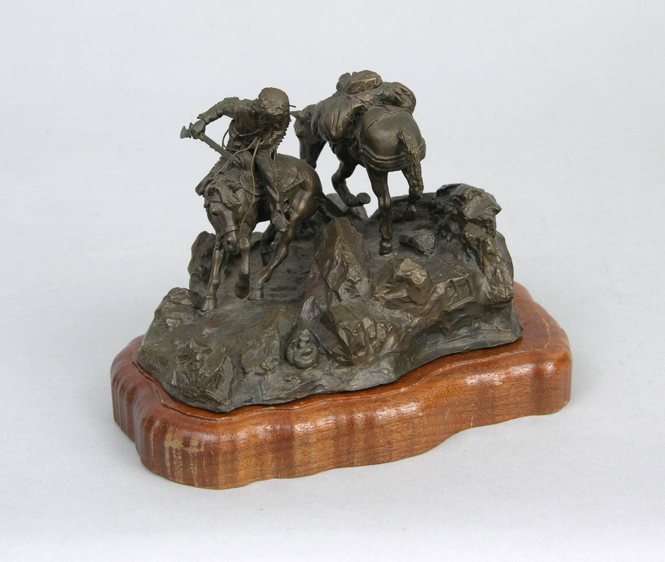 A miniature bronze sculpture by Donald Jack Polland, 1969