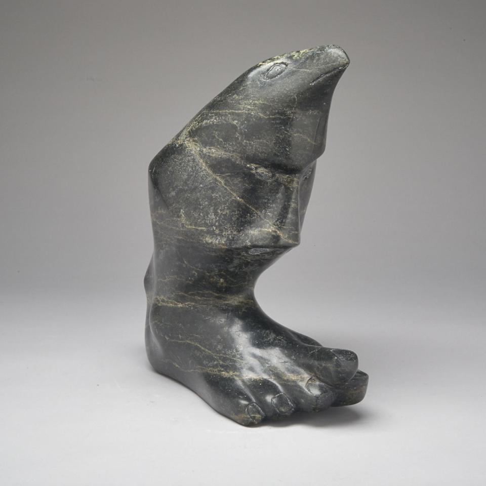 Artwork by Qarpik Pudlat, COMPOSITION CARVING OF A FOOT, BIRD AND FACES, Made of stone