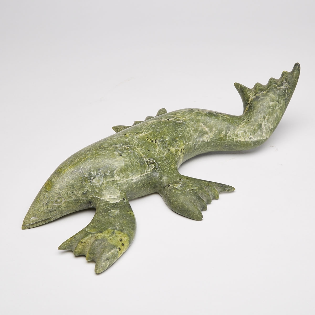 Artwork by Tukiki Manomie, E7-1506, CAPE DORSET / KINNGAIT SEA CREATURE, Made of stone