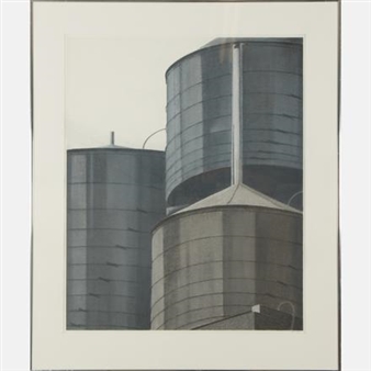 An industrial photograph of three large metal silos with a muted, overcast atmosphere.