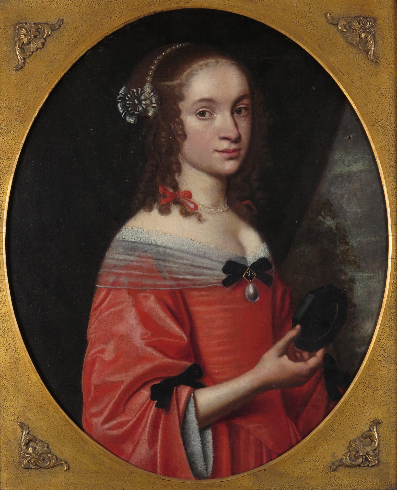 Gerrit van Honthorst | Portrait of a lady, half length, wearing red and ...