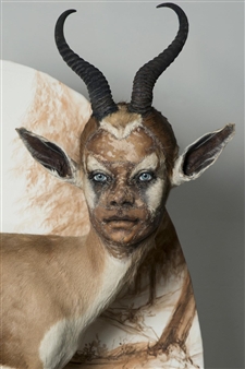 Kate Clark Synthesizes human faces with Taxidermied animals