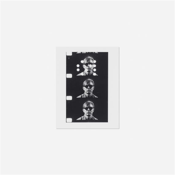 A black-and-white film strip print featuring three identical portraits of a person wearing sunglasses.