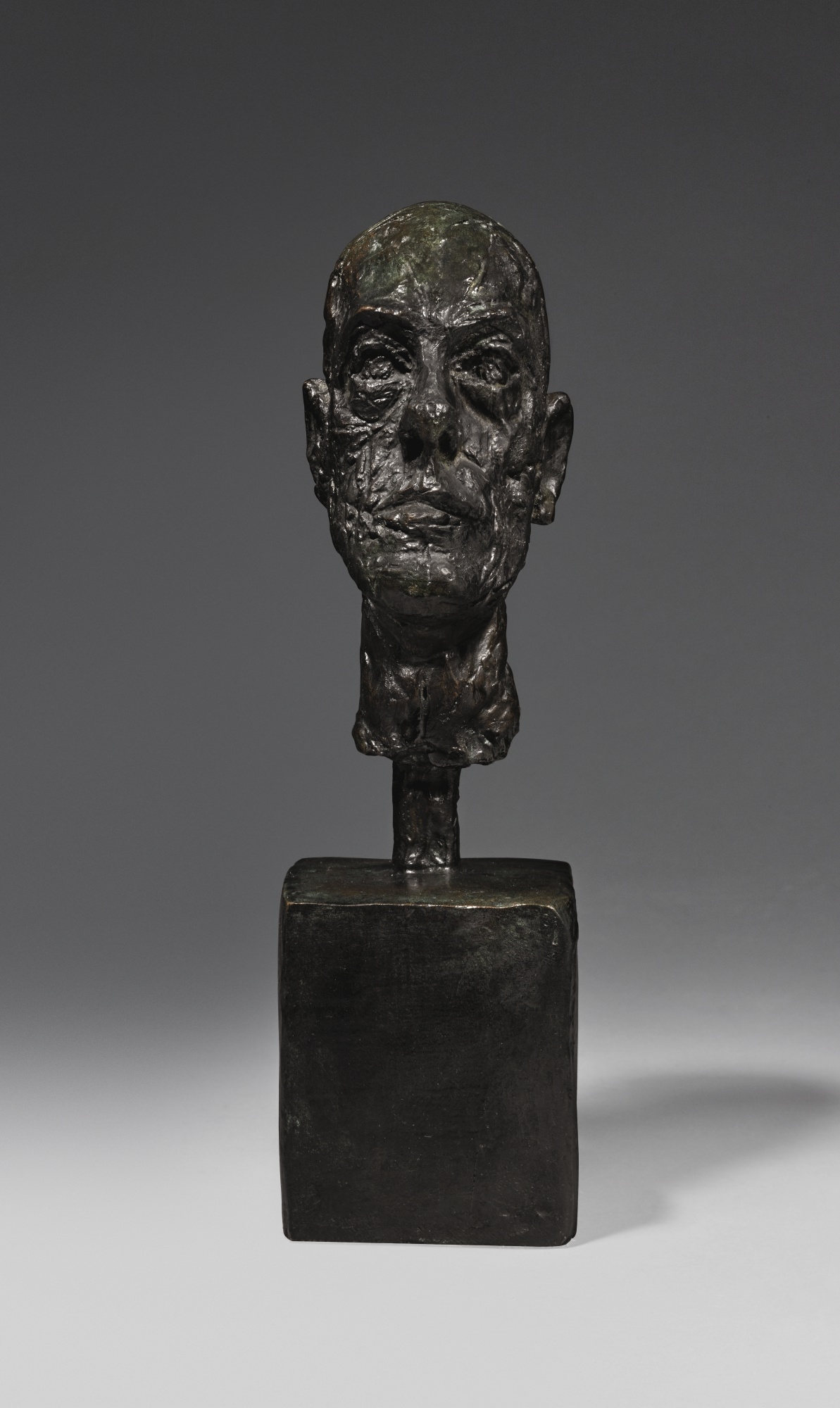 DIEGO (TÊTE SUR SOCLE CUBIQUE) by Alberto Giacometti, conceived 1958, cast 1960