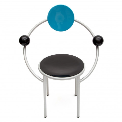 black seat and armrests and a blue circular back by Michele de Lucchi, 1983