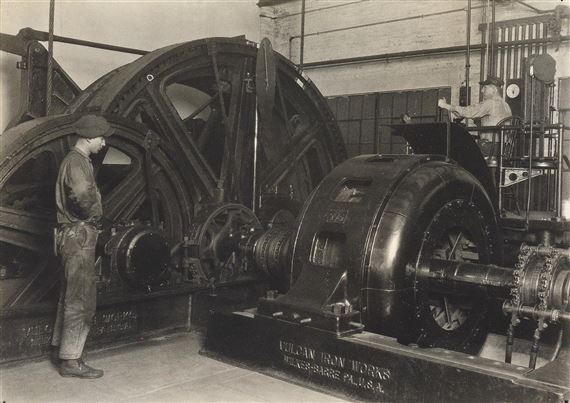 Workers operating machinery manufactured by Vulcan Iron Works by Lewis Hine, Circa 1925