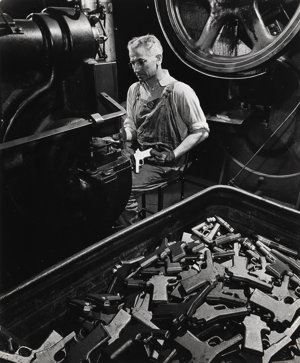 2 Works; Gunsmith shop near Police Headquarters on Grand Street, Manhattan ; Worker at Colt .45 Factory, Hartford, Conn