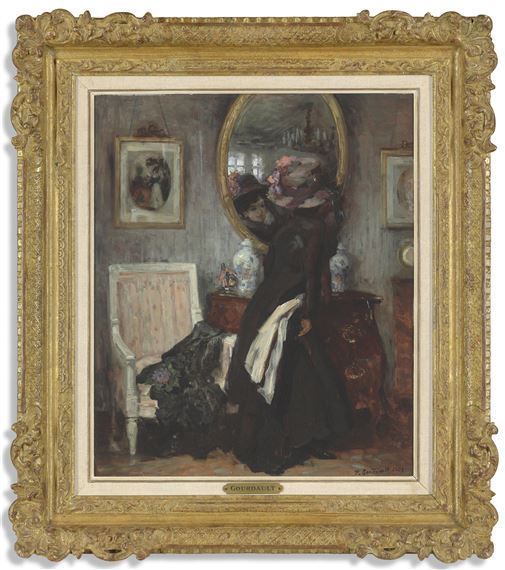 An elegant lady in front of a mirror by Pierre Gourdault, 1909