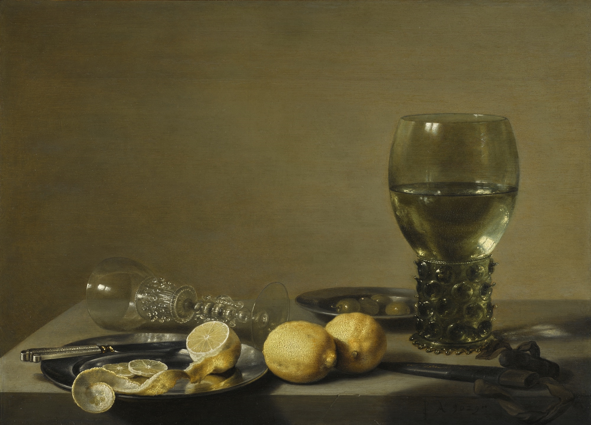 STILL LIFE OF LEMONS AND OLIVES, PEWTER PLATES, A ROEMER AND A FAÇON-DE-VENISE WINE GLASS ON A LEDGE by Pieter Claesz, 1629